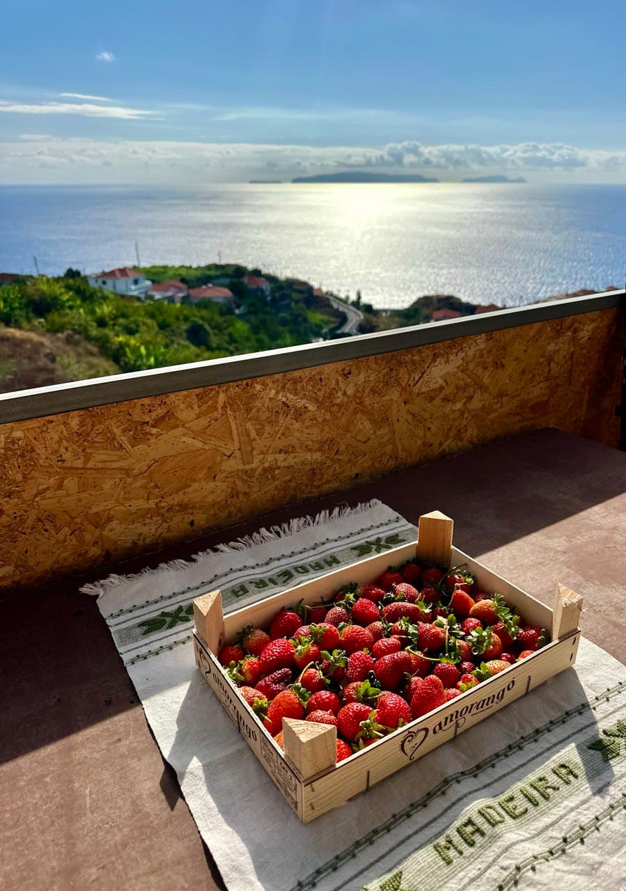 Fresh strawberries in wooden crate